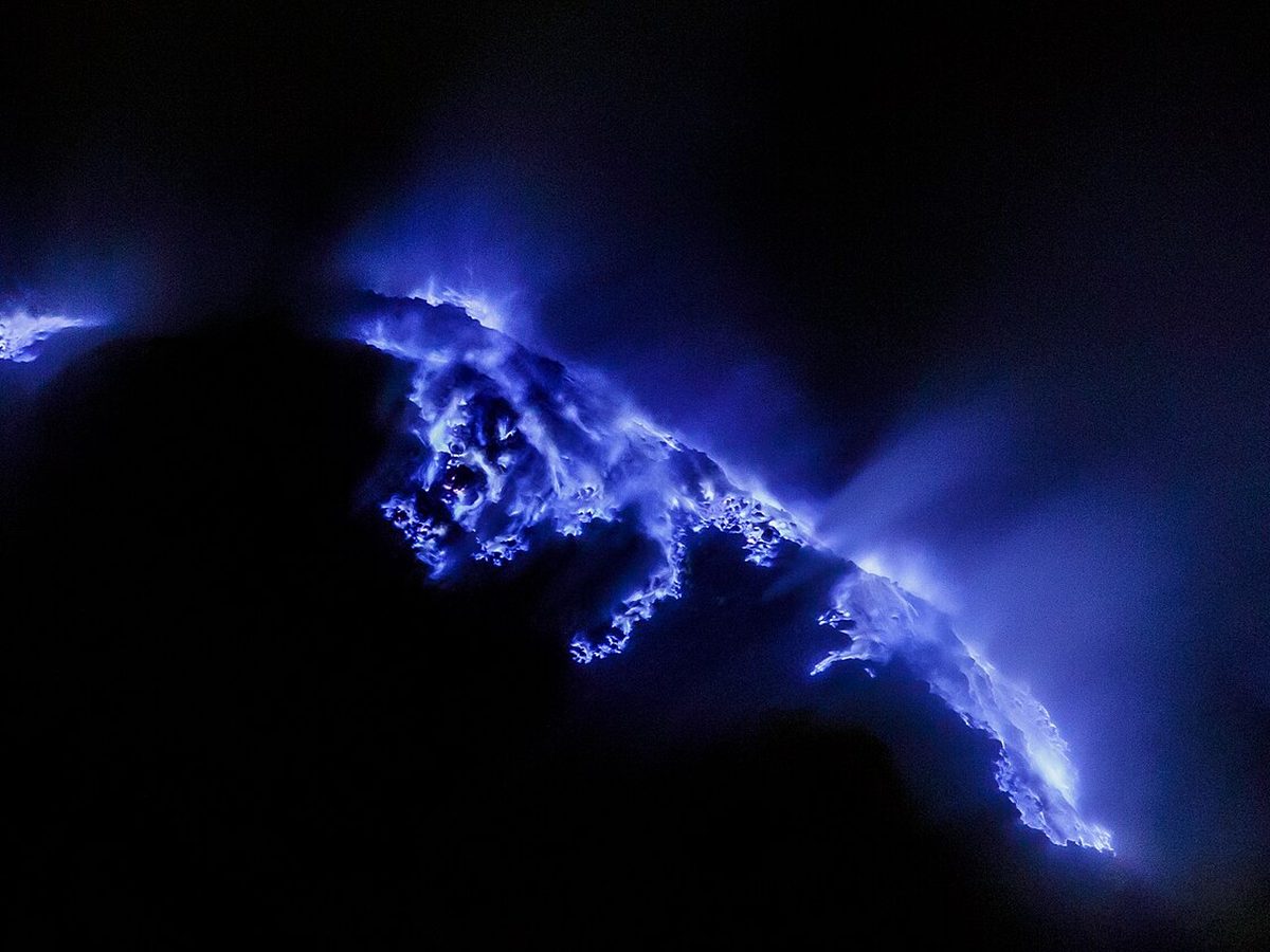 The electric-blue sulphur flames of the Kawah Ijen crater at night